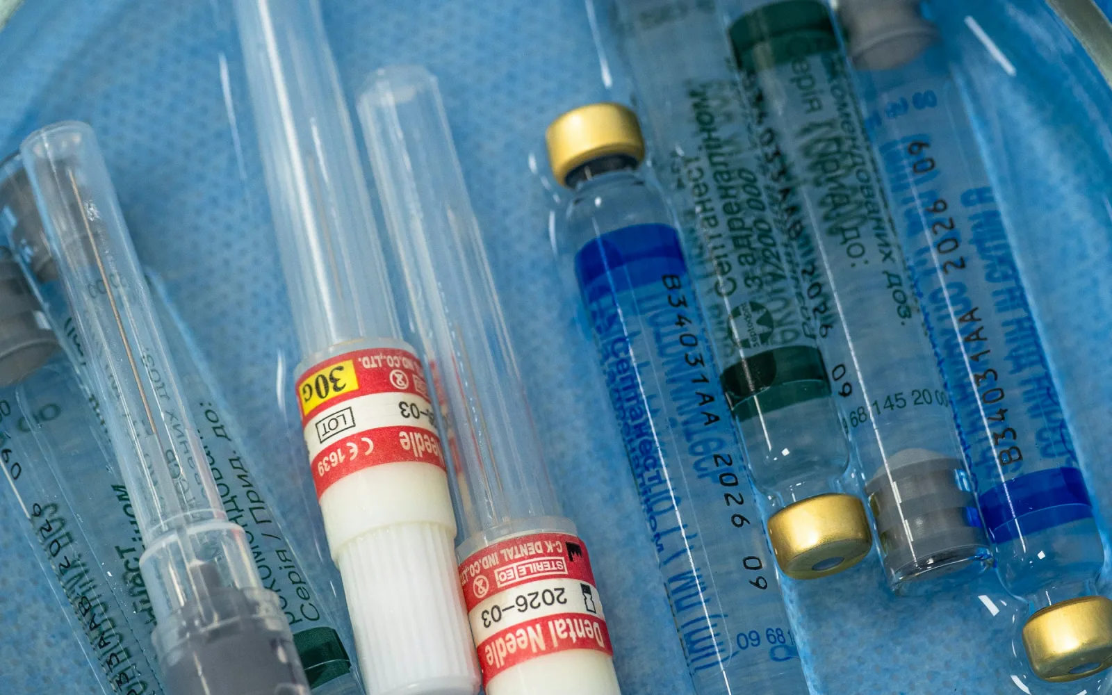 Sterile needles and sample tubes laid out in a tray for a biopsy or FNAC